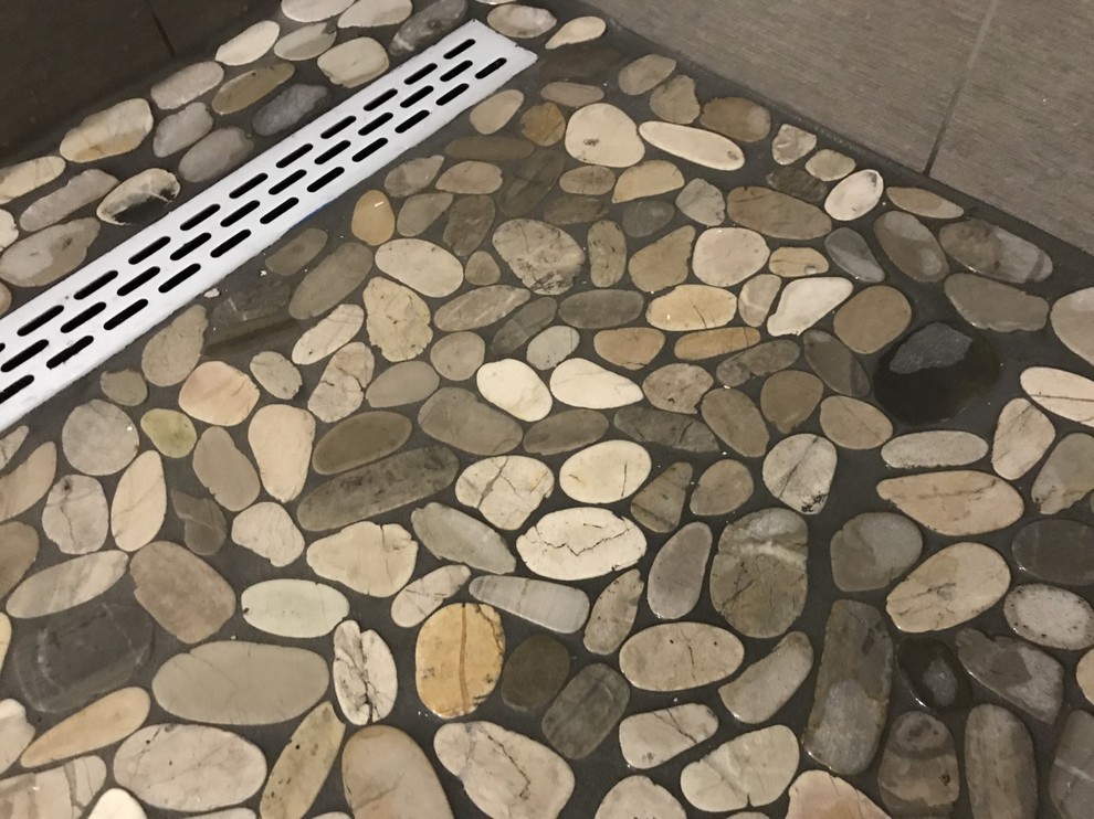What Are The Rock Shower Floor Upsides And Downsides?